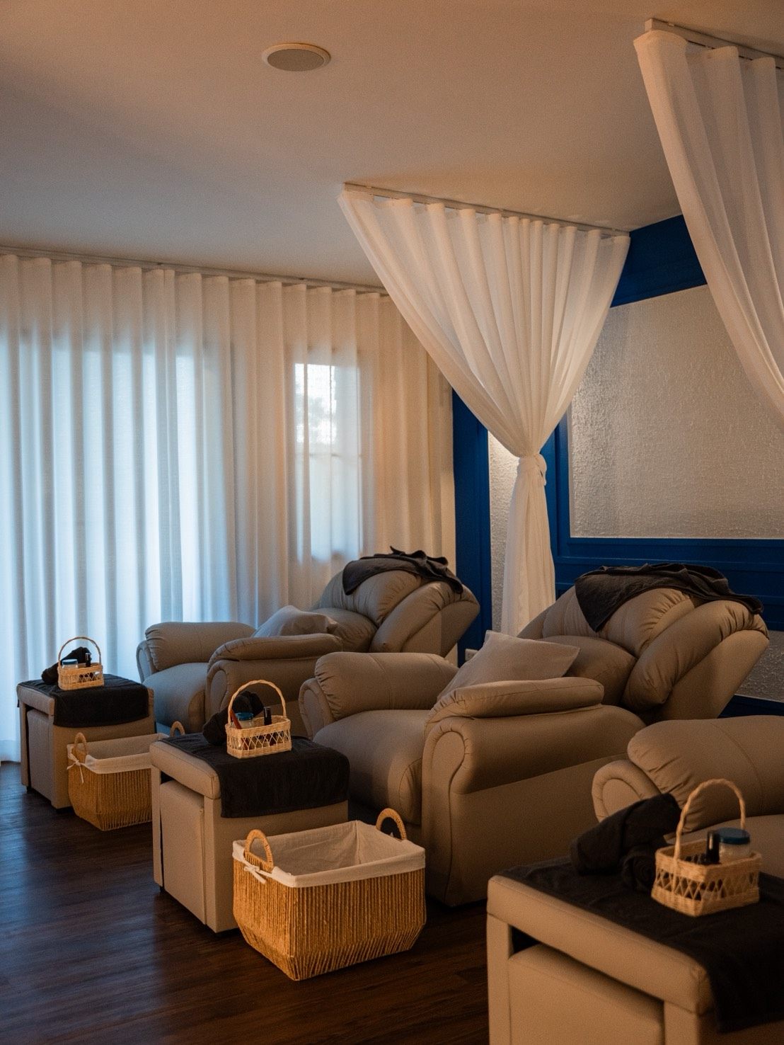 KHET Massage — foot massage lounge with recliners and canopy curtains